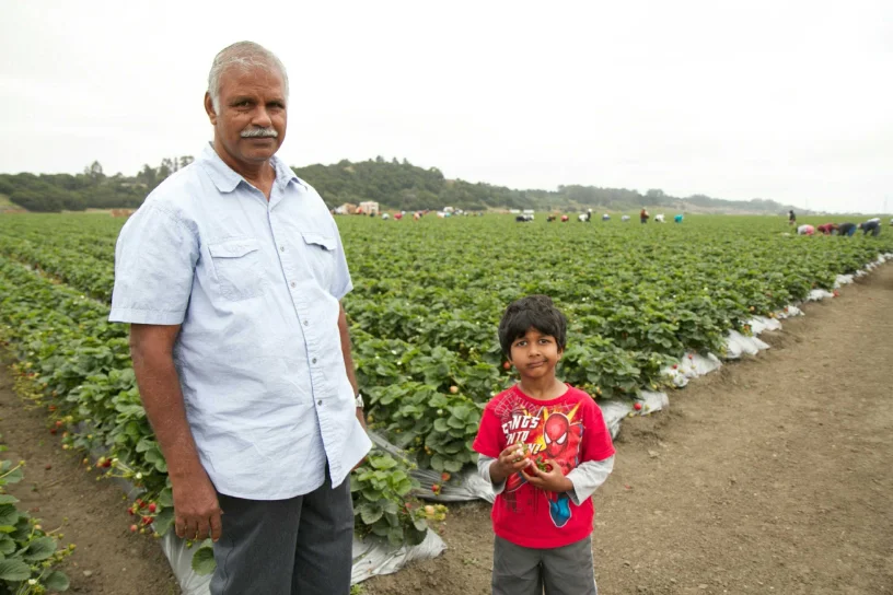 Photo: Mr. Sengottaian with family on the farm